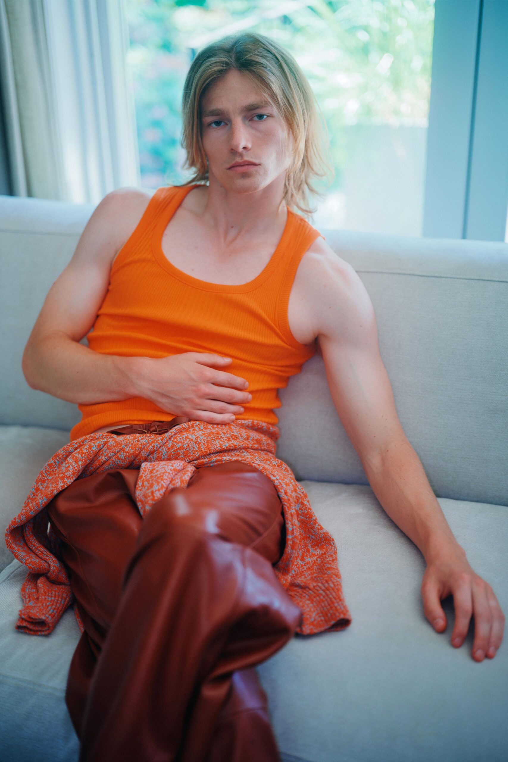 orange tank-top brown leather pants